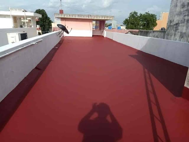 SS Projects team applying terrace waterproofing on a house in Nalgonda, Telangana